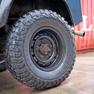 A defender sat on Modular black steel wheels