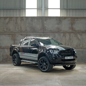 An image of a silver, sturdy and stylish alloy wheel with the DV8 logo engraved on the center cap. This wheel is specifically designed for Ford Ranger vehicles