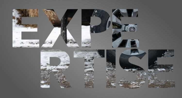 Land rover on mud track with the words expertise over the top