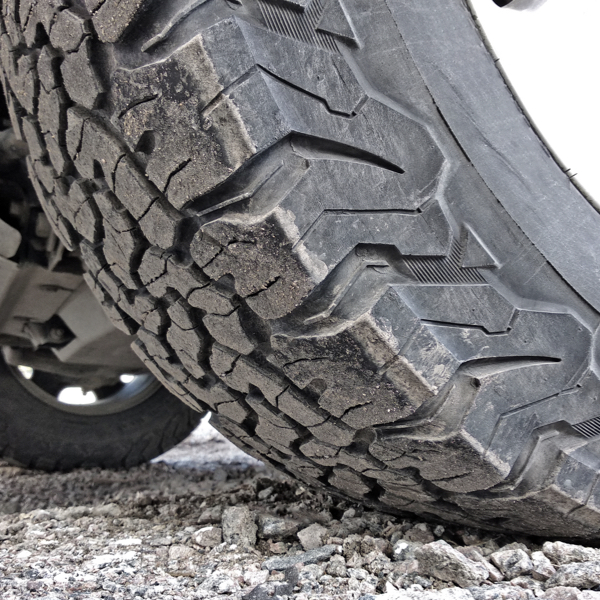 A close up of a tyre side wall of a showing its Reinforced Construction