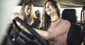 Happy 4x4 drivers driving without road noise - showing the Best All Terrain Tyres for Road Noise