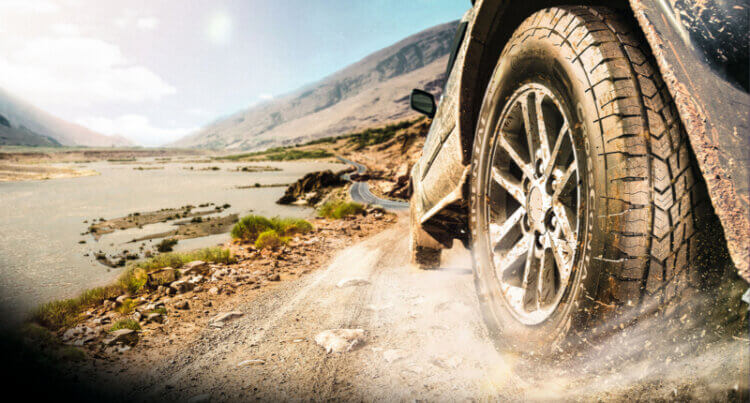 Continental 4x4 Contact showing superb traction a it drives up a dust track