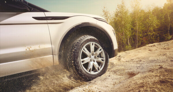 Continental 4x4 Contact tyre on a land rover moving up a dust track