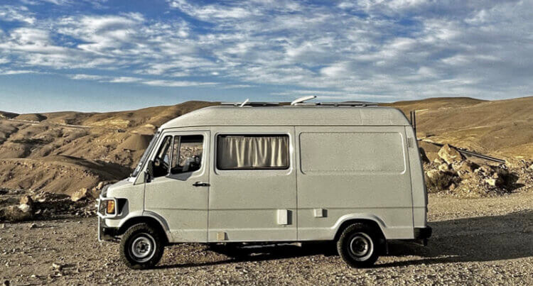 A classic motorhome on sand using general grabber at3 camper showing its built for Built for Freedom and Flexibility