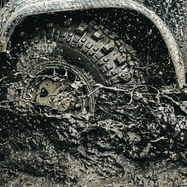 A 4x4 using its Mud Terrain Tyres showing its Aggressive tread design