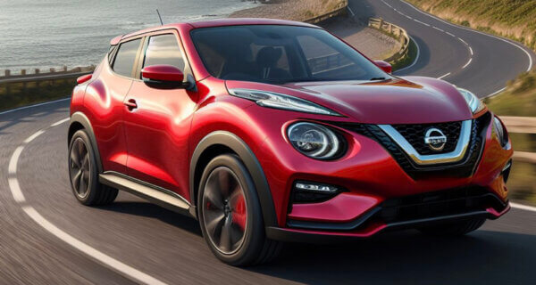 Nissan Juke driving down a coastal road in the UK sat on Nissan Juke Tyres