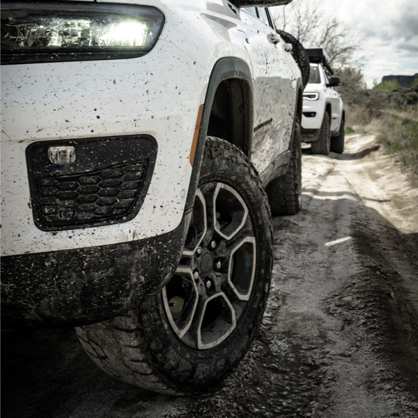 a close up of a SUV using rugged tyres showing why Choosing Terrain Tyres for Your Vehicle is a choice