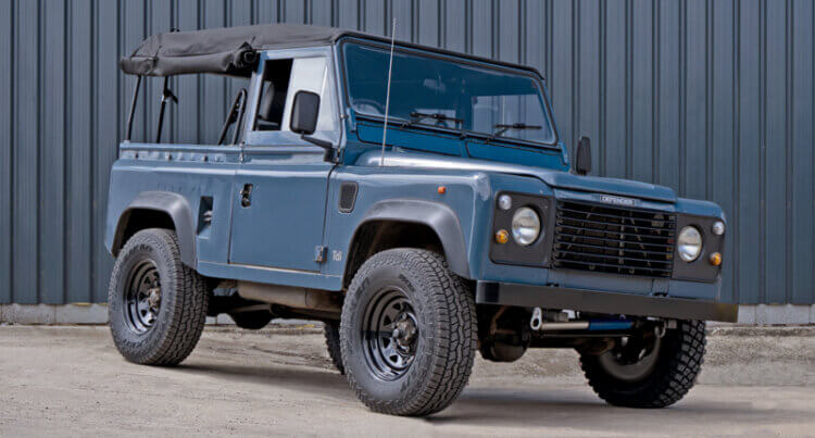 A land rover defender sat on steel wheels by tuff torque